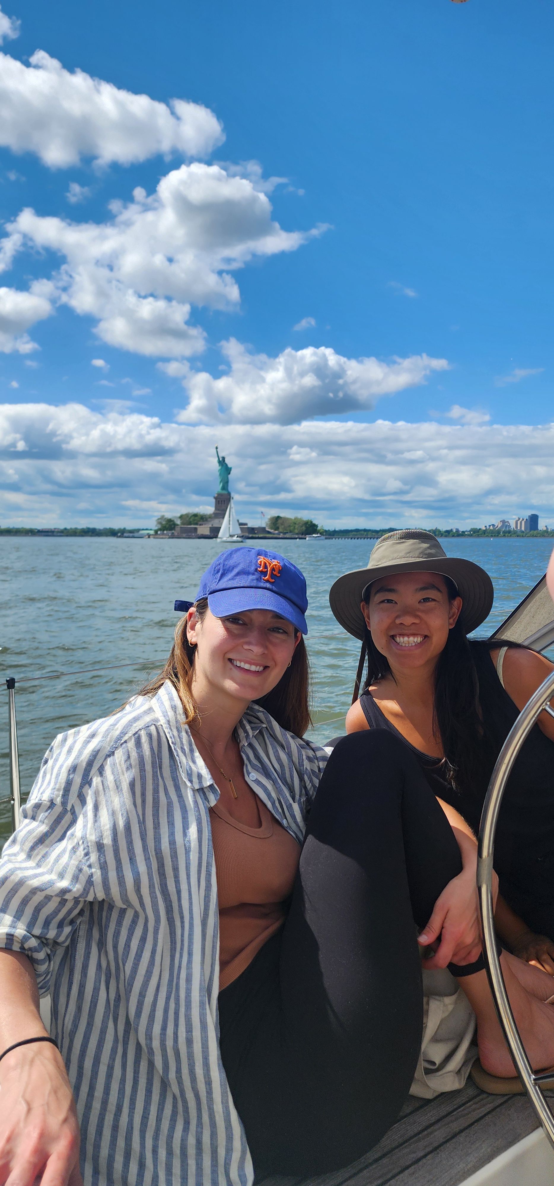 Guests on board with the Statue of Liberty
